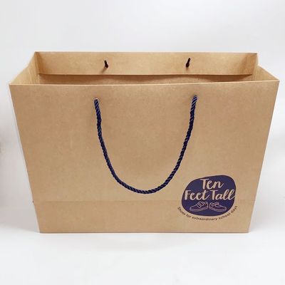 Guter Preis Aufbereitete Kraftpapier-Papiertüte-kundenspezifische Drucksache-Geschenk-Taschen mit Nylonseil Online
